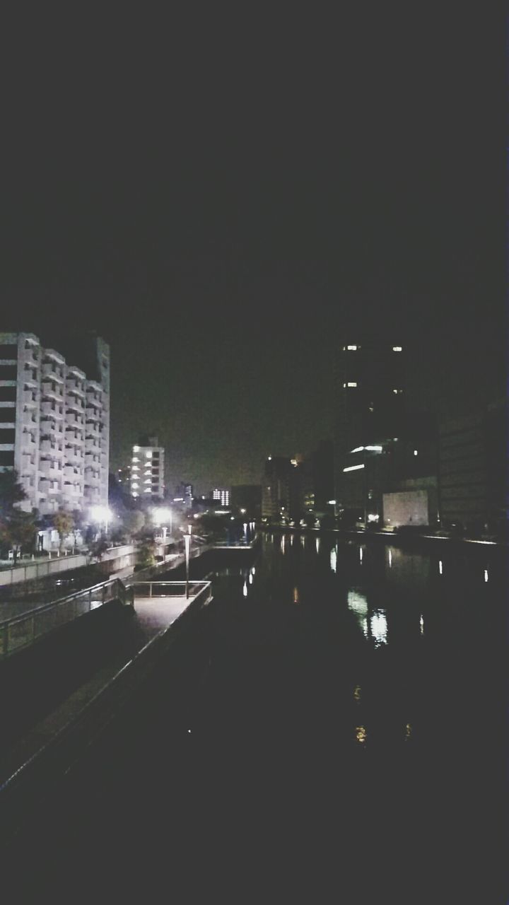 architecture, illuminated, night, city, built structure, building exterior, transportation, outdoors, road, modern, cityscape, skyscraper, no people, sky