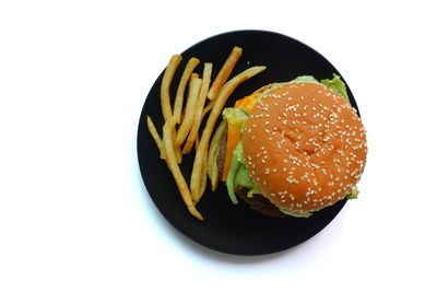 High angle view of burger against white background