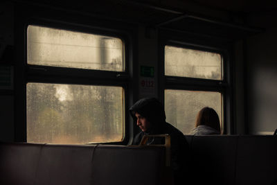 Portrait of man in train