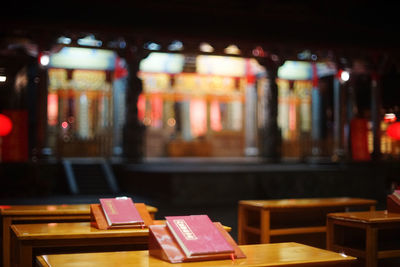 Close-up of books on table in restaurant