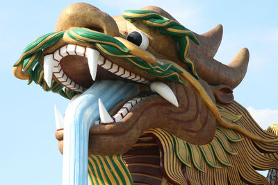 Low angle view of sculpture against clear sky