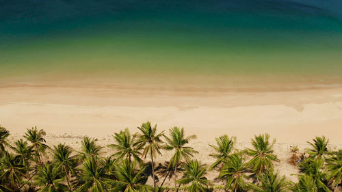 Wide sand beach nacpan beach. seascape with tropical beach and islands. 