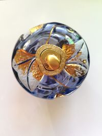 High angle view of wedding rings on white background