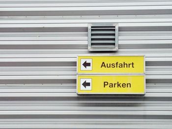 Exit and parking direction traffic sign