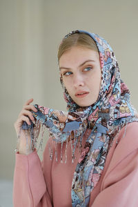 Young woman wearing a headscarf