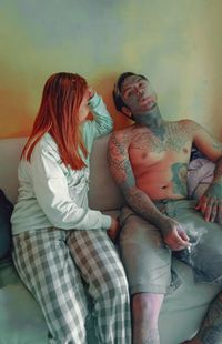 Full length of couple kissing outdoors