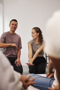 Teachers and children in first aid class