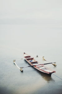 High angle view of boat in sea against sky