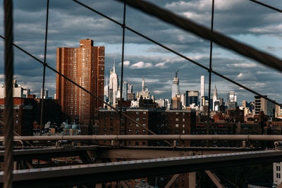 Modern buildings in city against sky