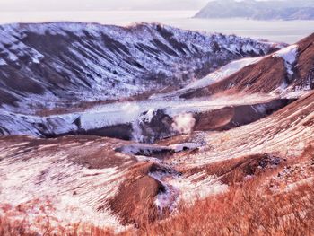 Aerial view of snow covered land