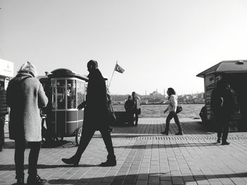 Silhouette of woman against clear sky