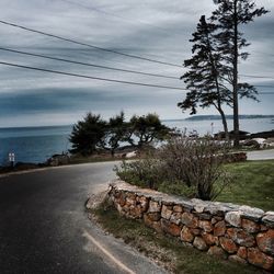 Road against cloudy sky