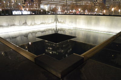 High angle view of building lit up at night