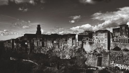 High angle view of buildings at pitigliano against sky