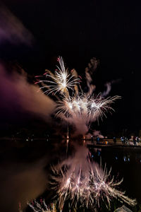 Firework display at night