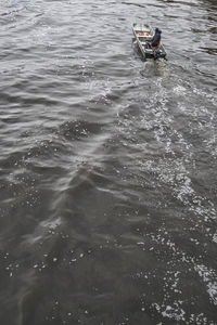 Man in boat on lake