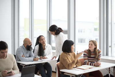 Teacher and adult students in class