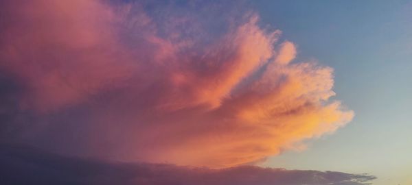 Low angle view of dramatic sky during sunset