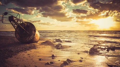 Scenic view of sea at sunset