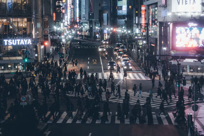 High angle view of crowd on road at night