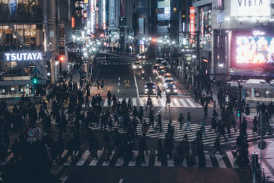 High angle view of crowd on road at night