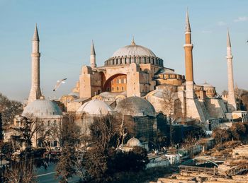 Low angle view of mosque against sky