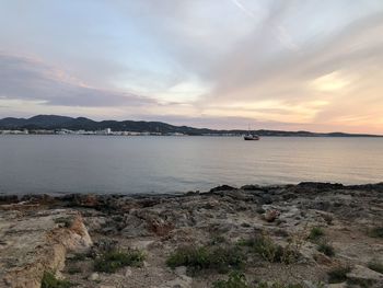 Scenic view of sea against sky during sunset