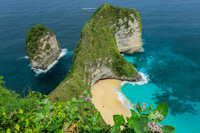 High angle view of rocks on sea