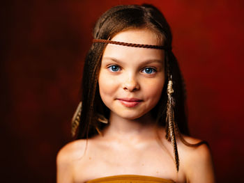 Close-up portrait of serious young woman