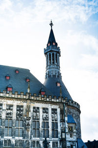 Low angle view of church against sky in town