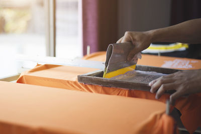 Close-up of hands working