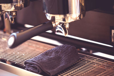 Close-up of coffee maker in cafe