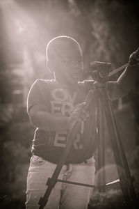 Full length portrait of young man standing outdoors