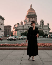 Rear view of woman walking on street