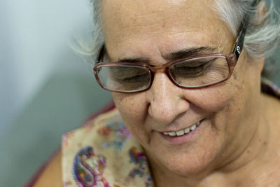 Close-up portrait of smiling young woman