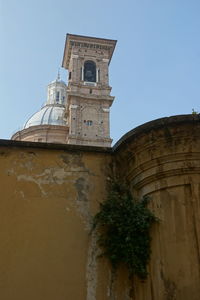 Low angle view of old building against sky