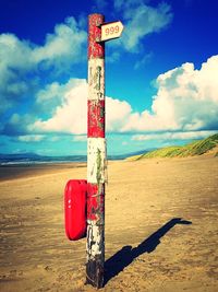 View of beach against blue sky