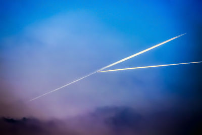 Low angle view of vapor trail in sky