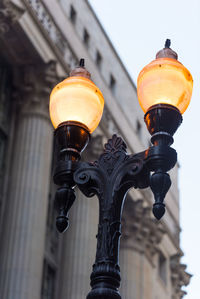 Low angle view of illuminated street light