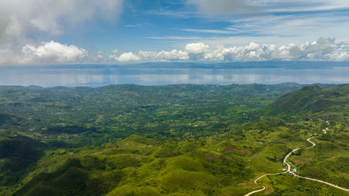Mountains to the sea and the island of cebu. negros, philippines