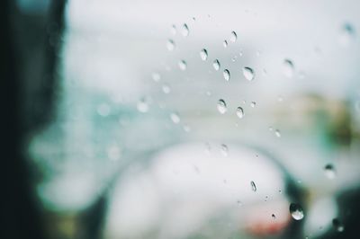 Close-up of wet window in rainy season