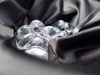 Close-up of hand holding wedding rings