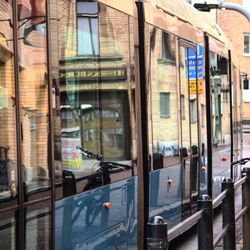 Reflection of train on glass window