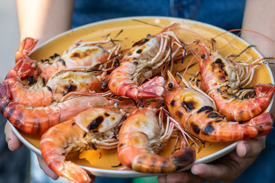 Close-up of hand holding food