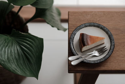 High angle view of coffee cup on table