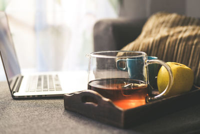 Close-up of coffee cup on table