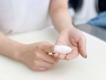 Close-up of woman holding hands