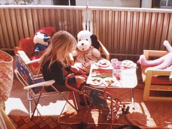 Group of people sitting on table