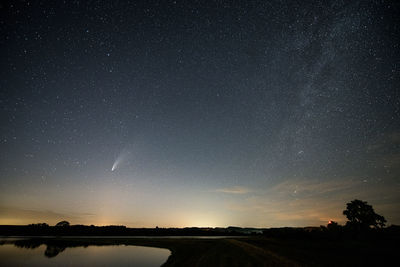 Scenic view of star field against sky at night