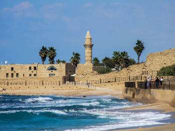 Sea by caesarea maritima against sky